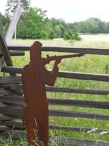 Man Firing Rusty Sculpture - Murfreesboro, TN.jpg
